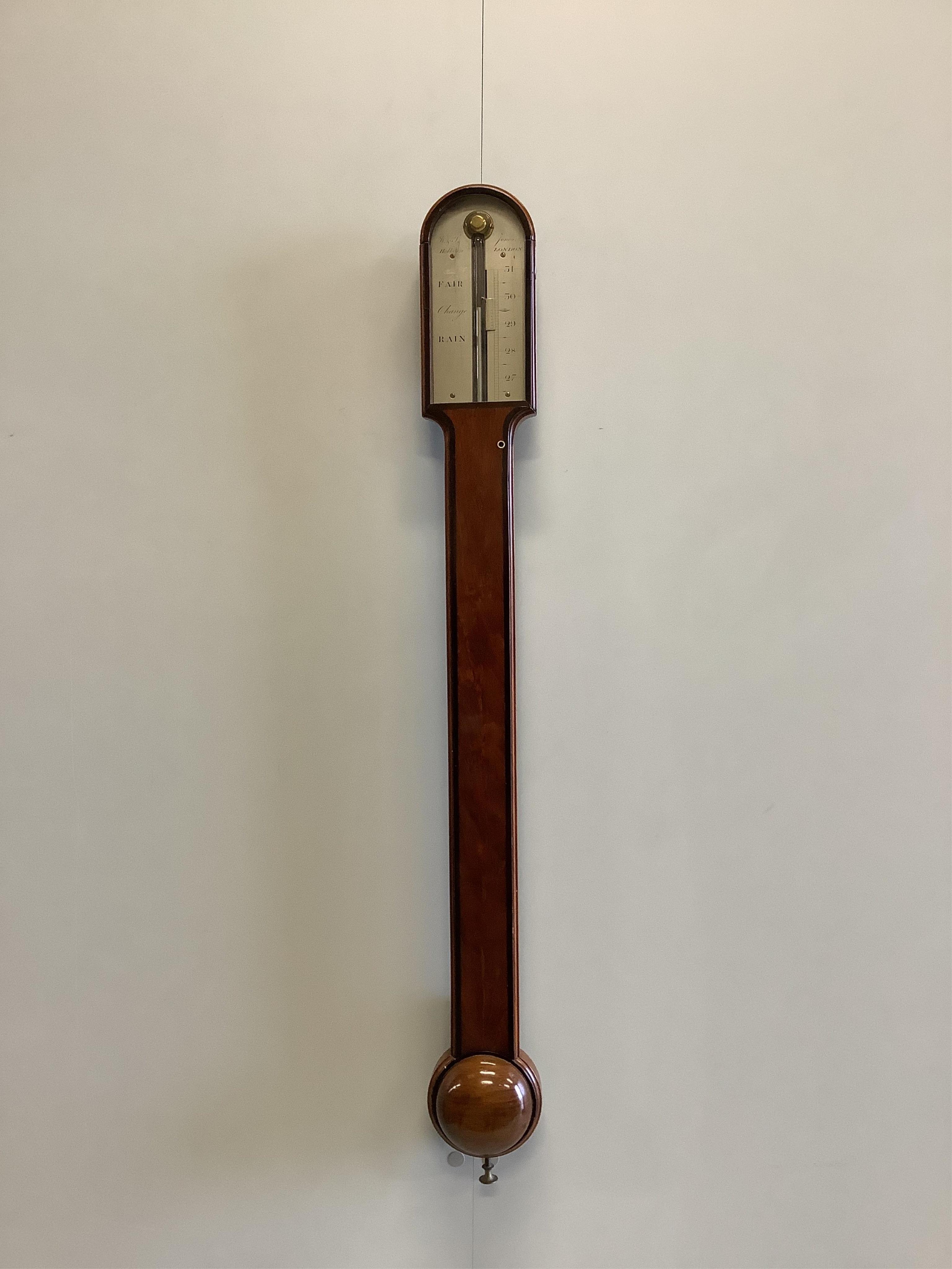 An early 19th century walnut stick barometer by Jones Holborn, height 95cm. Condition - good